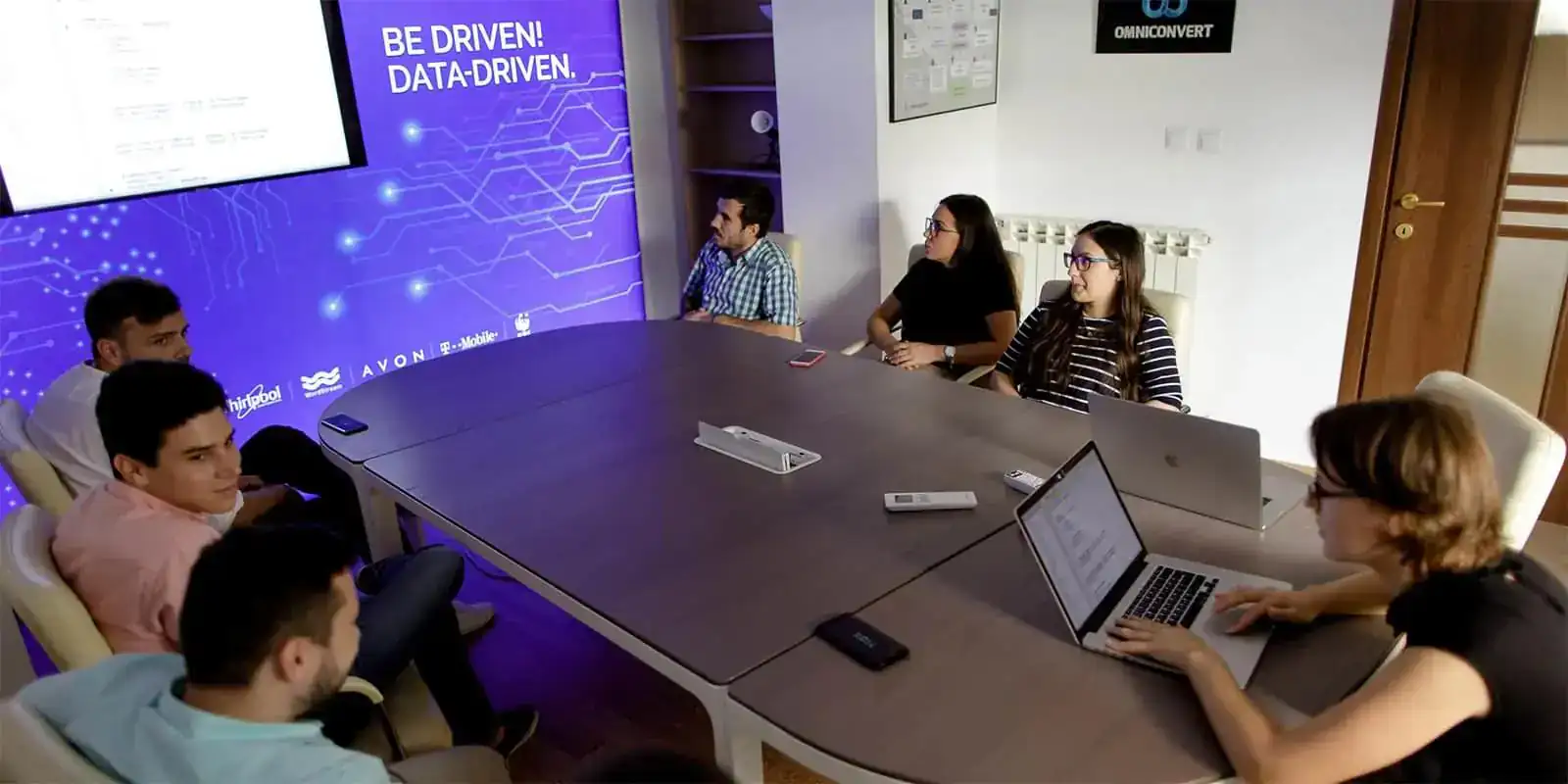 Photo of people in conference room
